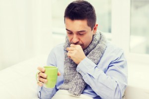 man coughing from acute bronchitis